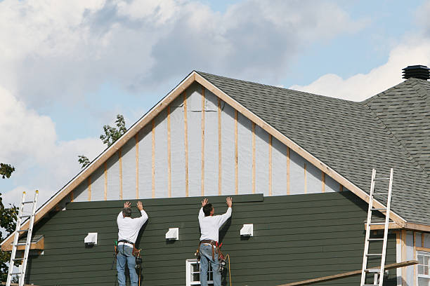 Professional Siding Installation technician working in Westport, IN